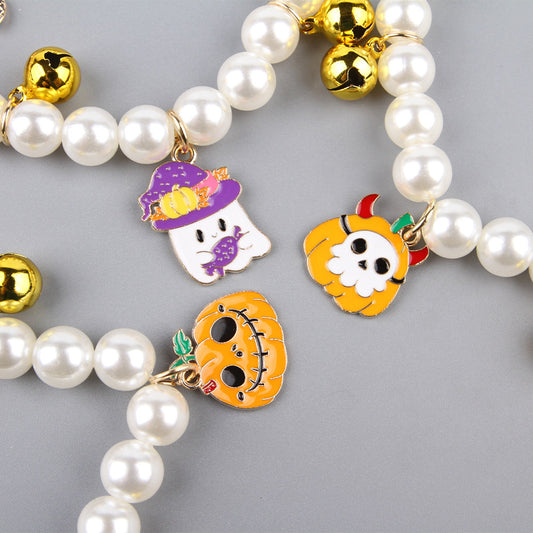 KFX-1061309 Halloween Cat Collar with Simulated Pearl Decoration in Purple Ghost, Skull, and Smile Pumpkin Designs