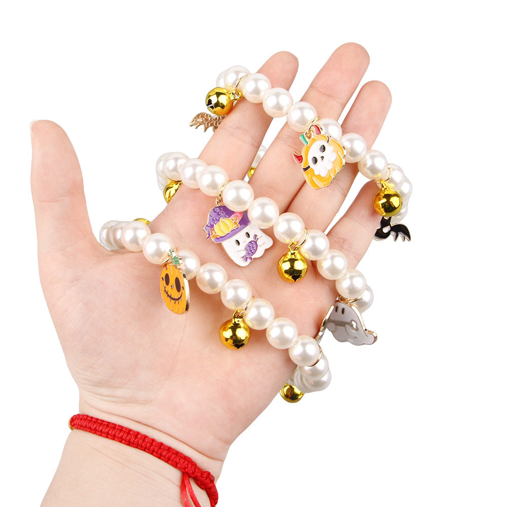KFX-1061309 Halloween Cat Collar with Simulated Pearl Decoration in Purple Ghost, Skull, and Smile Pumpkin Designs