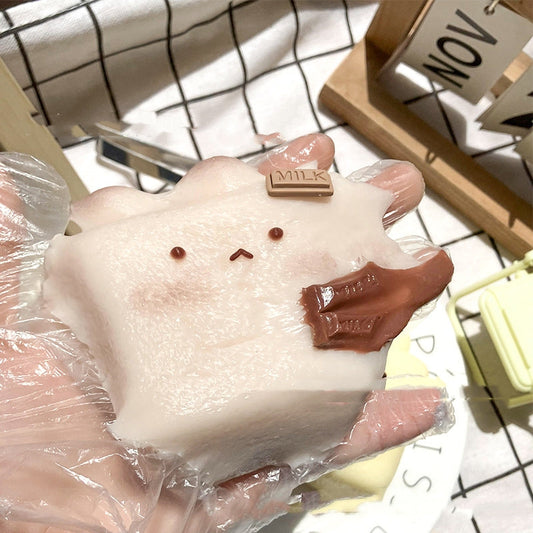 KFX-7029693 Silicone Rabbit Rice Cake Squeezing Toy in Chocolate and Poached Egg Colors