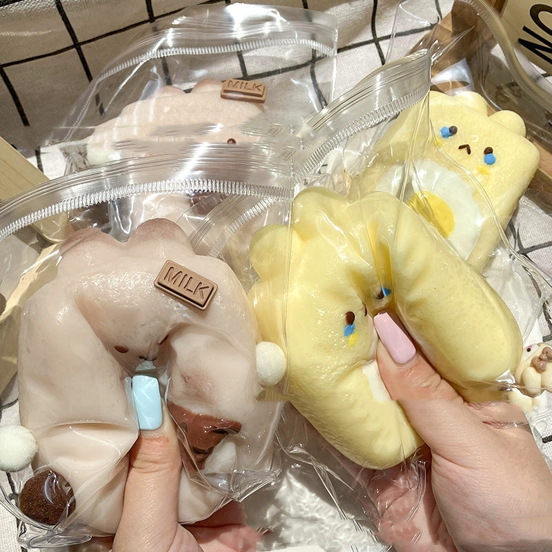 KFX-7029693 Silicone Rabbit Rice Cake Squeezing Toy in Chocolate and Poached Egg Colors