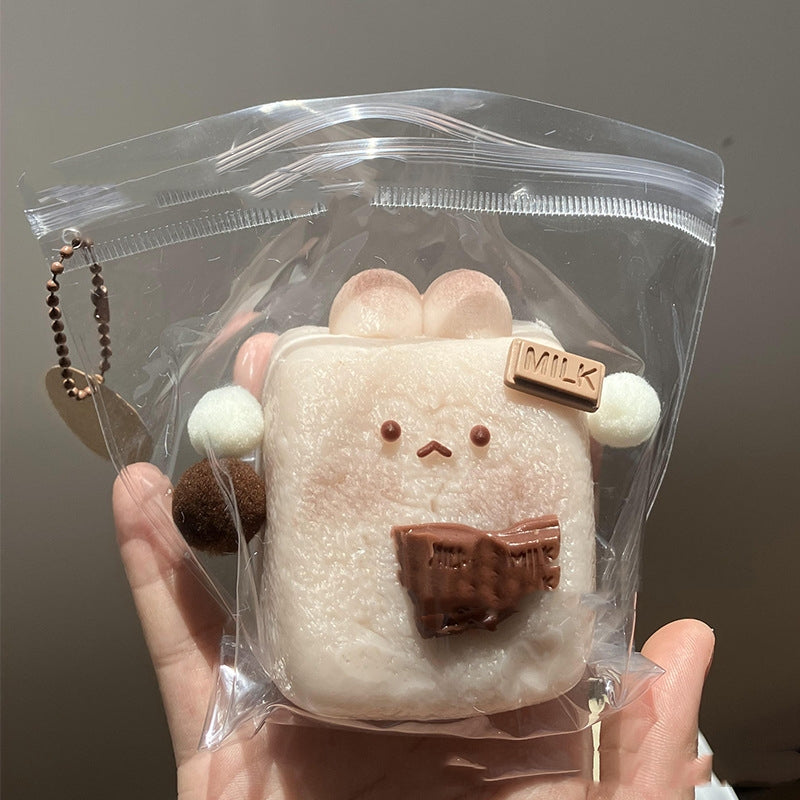 KFX-7029693 Silicone Rabbit Rice Cake Squeezing Toy in Chocolate and Poached Egg Colors