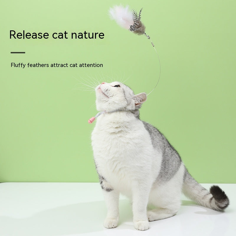 KFX-8176573 Cat Teaser Toy with Head-Mounted Feathers - Pink Silicone and Elastic String