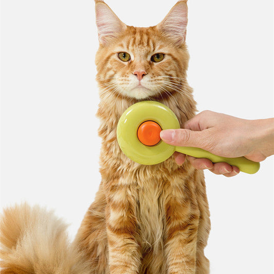 KFX-8564797 Doughnut-Shaped Cat De-shedding Comb with Fine Needle Design in Green, White, and Pink
